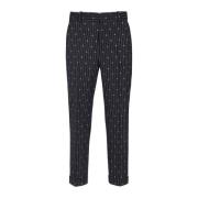 Monogrammed wool trousers with creases and thin stripes
