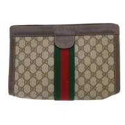 Pre-owned Canvas clutches