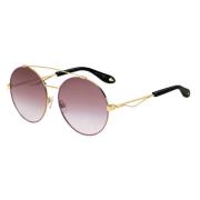 Stilfulde solbriller med lyserøde gradientlinser