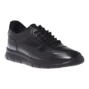 Trainers in black leather