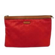 Pre-owned Canvas clutches