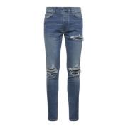 MX1 Distressed Skinny Jeans