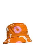 Mäkikaura Unikko Accessories Headwear Bucket Hats Orange Marimekko