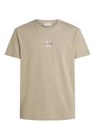 Monologo Tee Tops T-Kortærmet Skjorte Beige Calvin Klein Jeans