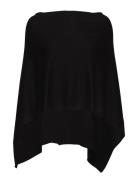 Poncho From Freequent In A Soft Knit Material. The Poncho Is An Over M...