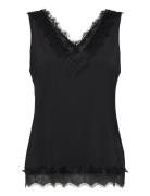 Top From Freequent In A Light Material. The Top Has A Simple Silhouett...